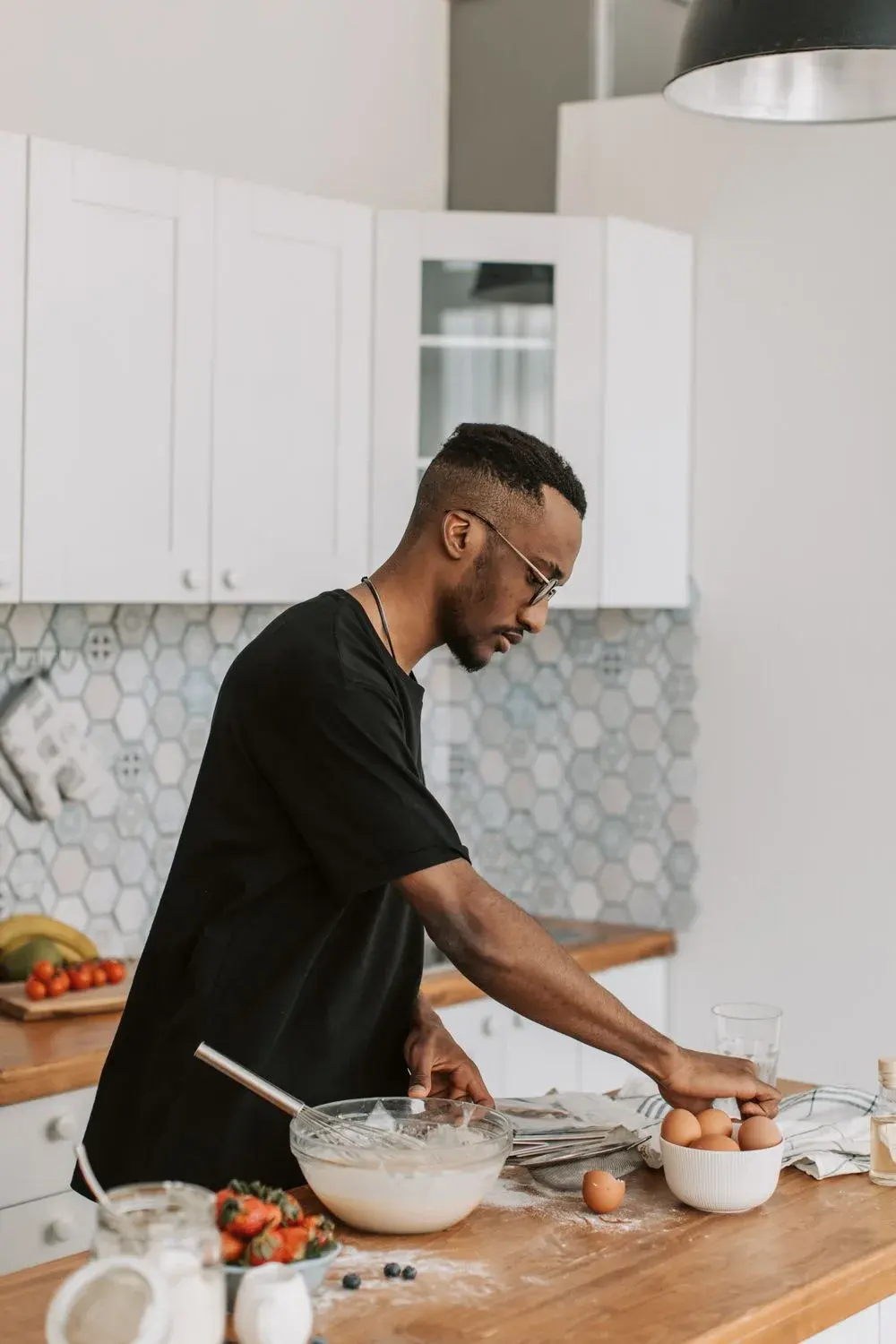 Cook preparing food in a kitchen