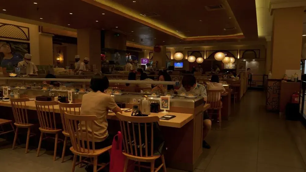 Guests dining at tables in a restaurant